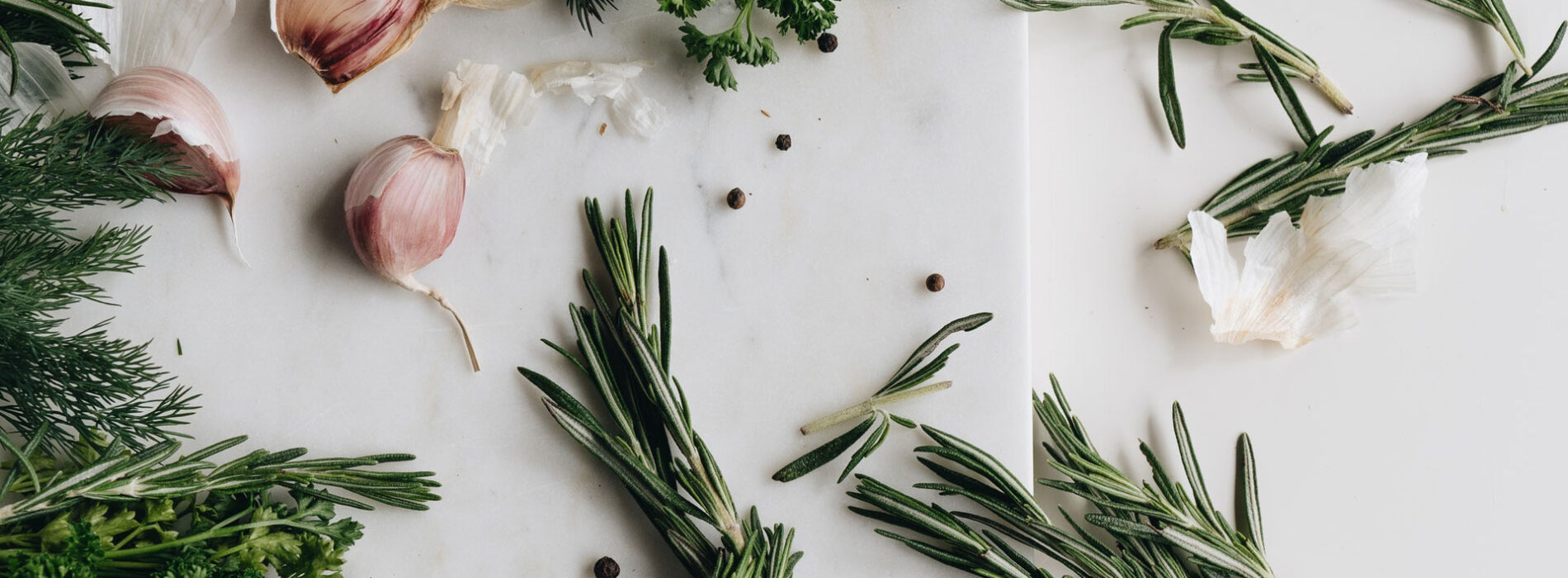 Herbs and Garlic on Countertop